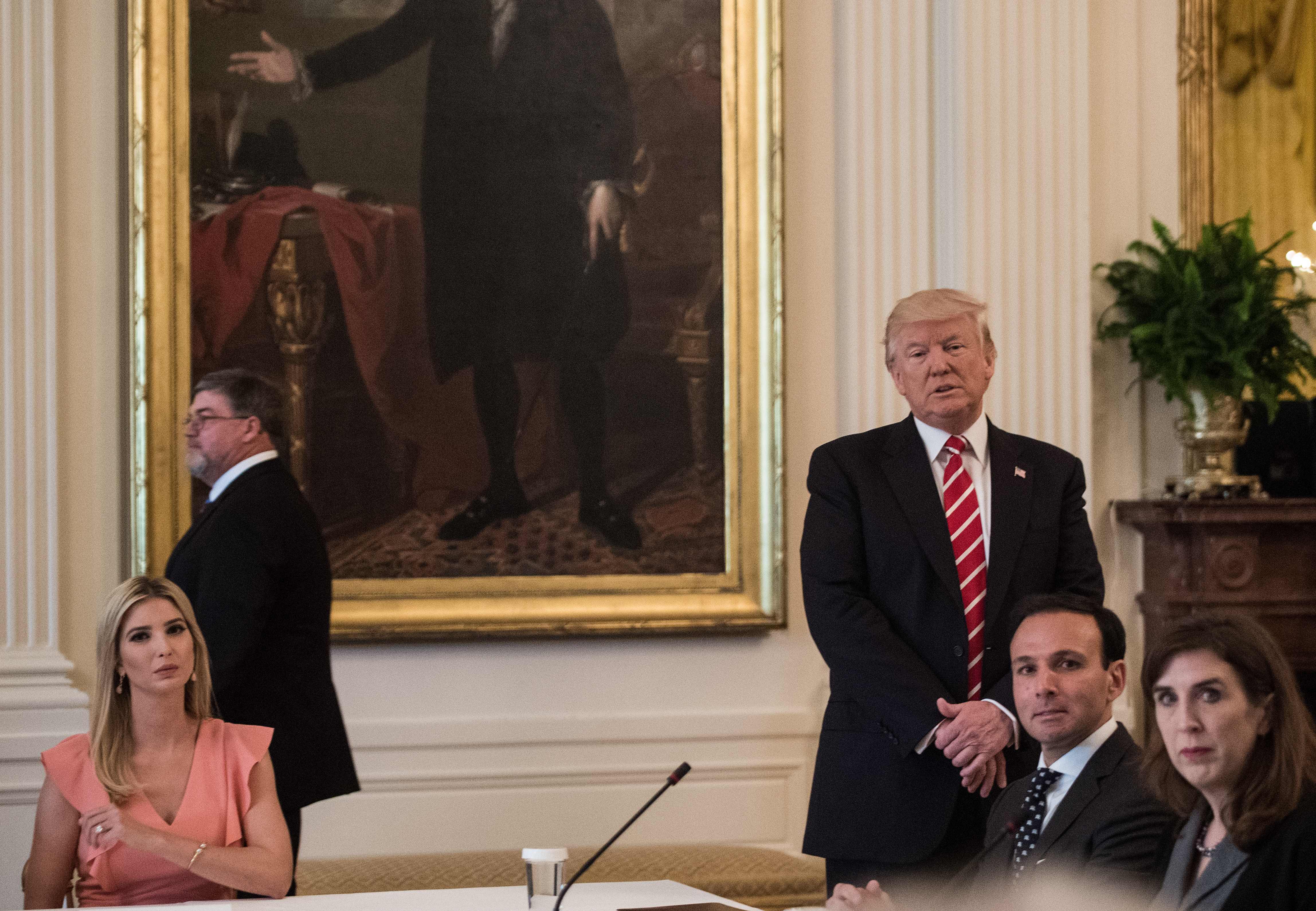 US President Donald Trump and his daughter Ivanka attend an American Leadership in Emerging Technology roundtable in the East Room of the White House in Washington, DC, on June 22, 2017. (NICHOLAS KAMM/AFP/Getty Images)