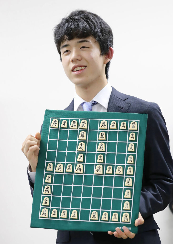 Junior high school student Sota Fujii posing for photographers in Tokyo on June 26, 2017. (STR/AFP/Getty Images)