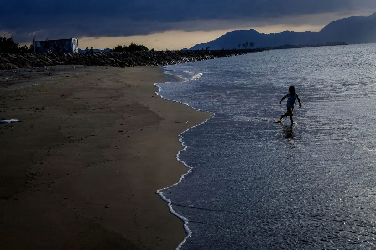 A kid plays on the beach on Dec. 13, 2014 in Banda Aceh, Indonesia. Aceh was the worst hit location, being the closest major city to the epicentre of the 9.1 magnitude quake, suffering a huge hit from the following tsunami and resulting in around 130,000 deaths. Throughout the affected region of eleven countries, nearly 230,000 people were killed, making it one of the deadliest natural disasters in recorded history. (Ulet Ifansasti/Getty Images)