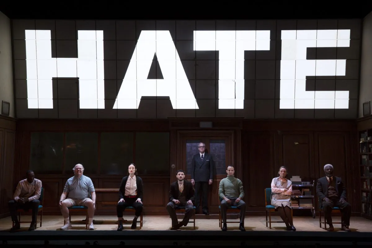 The cast of the stage adaptation of “1984,” now at the Hudson Theatre. The citizens of this dystopian world are subjected to doublespeak, in which black equals white and hate equals love. (Julieta Cervante)