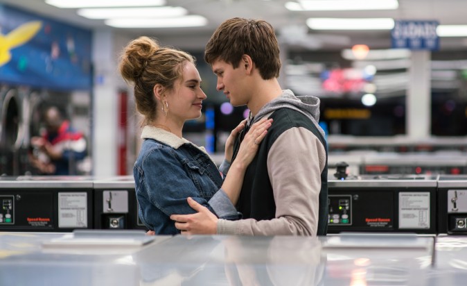 (L–R) Debora (Lily James) and Baby (Ansel Elgort) do Deborah's laundry in TriStar Pictures'