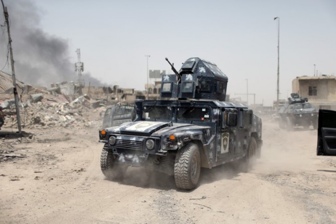 A military vehicle of the Emergency Response Division is seen during the fight with the Islamic States militants in the Old City of Mosul, Iraq, July 3, 2017. (REUTERS/Ahmed Jadallah)