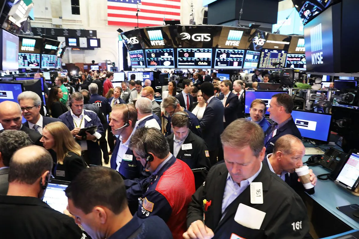 Traders work on the floor of the New York Stock Exchange on June 30, 2017. The S&P 500 had a strong first half of 2017, led by tech and health care. (Spencer Platt/Getty Images)