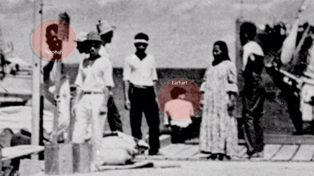 A newly discovered photo shows a woman who resembles Amelia Earhart and a man who appears to be her navigator, Fred Noonan. (National Archives)