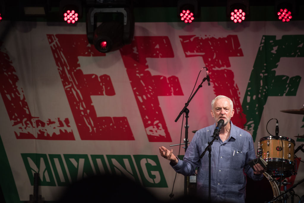 Labour Party leader Jeremy Corbyn speaks to crowds at Left Field Stage at Glastonbury Festival Site in Glastonbury, England on June 24, 2017. (Chris J Ratcliffe/Getty Images)