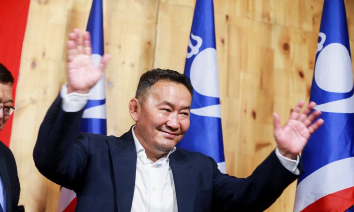 Khaltmaa Battulga, from the main opposition Democratic Party (DP), arrives to a press conference after he won the presidential election in Ulan Bator on July 8, 2017. (Byambasuren Byamba-Ochir/AFP/Getty Images)