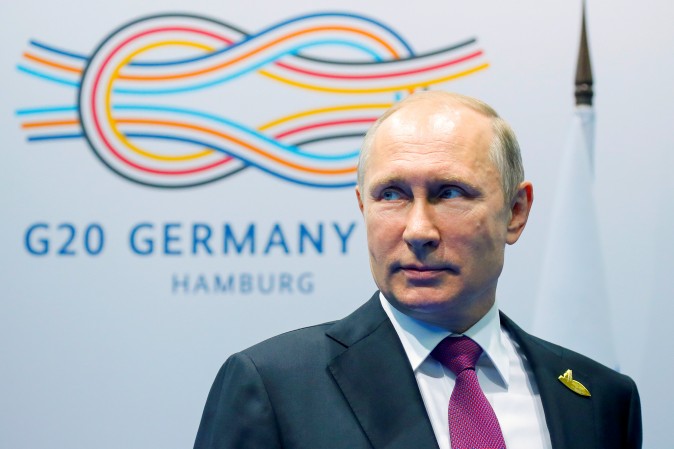 Russian President Vladimir Putin looks on before a meeting at the G-20 summit in Hamburg, Germany July 8, 2017. REUTERS/Alexander Zemlianichenko/Pool