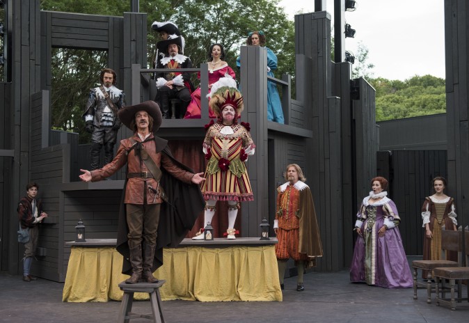 Cyrano (James Ridge, L-forward) is determined to stop the bad actor Montfleury (Brian Mani, C) from performing. (Michael Brosilow)