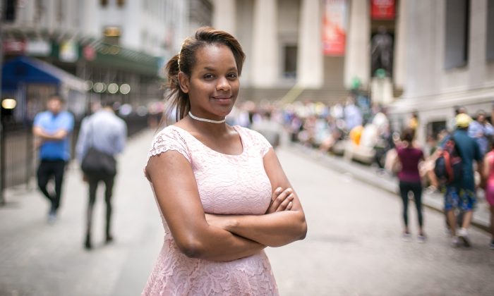 Adama Lee Bah, 22, in the Financial District of Manhattan on June 26, 2017. Bah, originally from Guinea, was 7 when she was forced to undergo female genital mutilation and she now works to help end the practice. (Benjamin Chasteen/The Epoch Times
