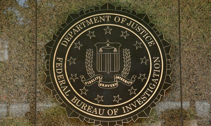 The FBI seal is seen outside the headquarters building in Washington, on July 5, 2016. 
(YURI GRIPAS/AFP/Getty Images)