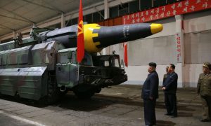 China Says to Enforce UN Curbs on North Korea as Trump Praises Cohesion