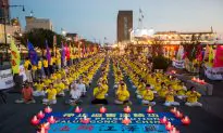 Falun Gong Practitioners Demand End to Eighteen Years of Persecution