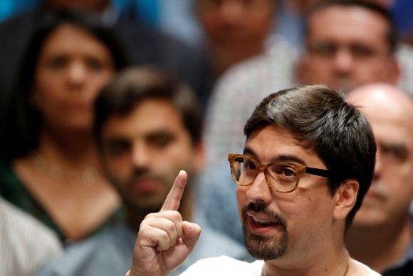 Freddy Guevara, first Vice-President of the National Assembly and lawmaker of the Venezuelan coalition of opposition parties (MUD), talks to the media during a news conference in Caracas, Venezuela July 17, 2017. (Reuters/Carlos Garcia Rawlins)