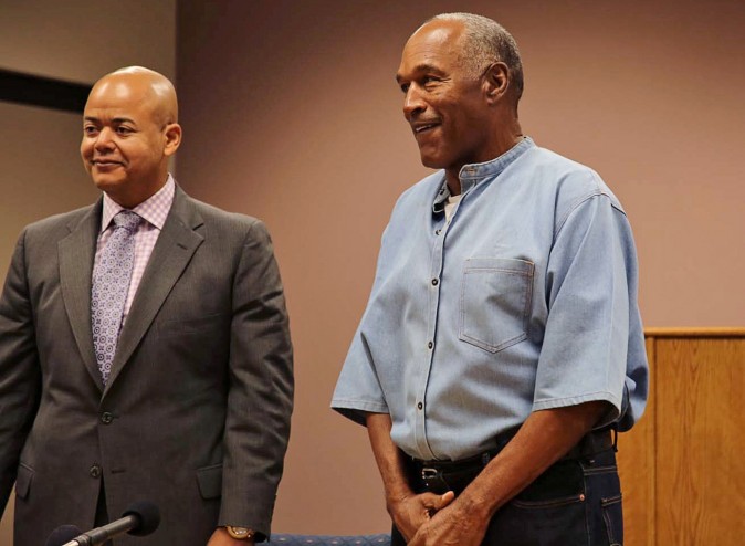 O.J. Simpson (R) arrives for his parole hearing with attorney Malcolm LaVergne at Lovelock Correctional Centre in Lovelock, Nevada, U.S. July 20, 2017. (Sholeh Moll/Nevada Department of Transportation/Handout via REUTERS)