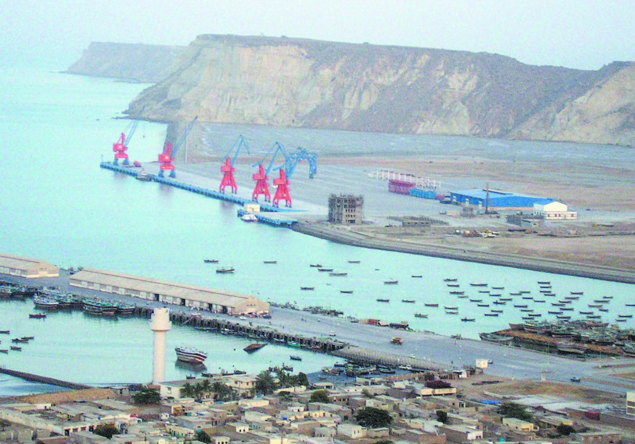 BOATS AT THE GWADAR PORT IN PAKISTAN ON THE ARABIAN SEA. China Overseas Ports Holding Company is leasing the port until 2059 and has already started expanding it. China has been looking to secure sea trading lanes along the so-called Maritime Silk Road, and the Pakistani port is an important piece in the puzzle. (J. PATRICK FISCHER/CC BY-SA)
