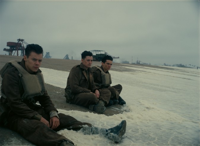 (L–R) Harry Styles as Alex, Aneurin Barnard as Gibson and Fionn Whitehead as Tommy in the Warner Bros. Pictures action thriller "Dunkirk,
