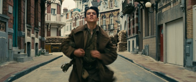  Fionn Whitehead as Tommy, running for his life in the Warner Bros. Pictures action thriller "Dunkirk,