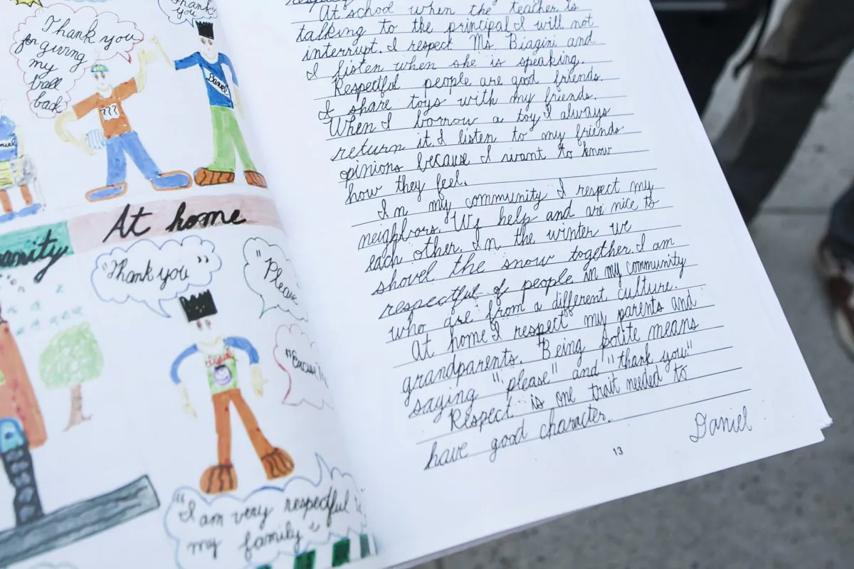 Writing by Daniel Shi, the winner of the cursive category of Zaner-Bloser's Nicholas Maxim Award, at the Borough Park Library in Brooklyn, New York, June 2, 2014. (Samira Bouaou/Epoch Times)