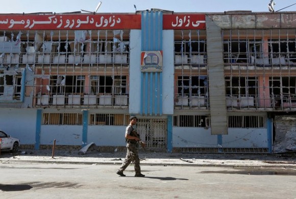 An Afghan security force officer keeps watch at the site of a suicide attack in Kabul, Afghanistan. July 24, 2017. (Reuters/Omar Sobhani)