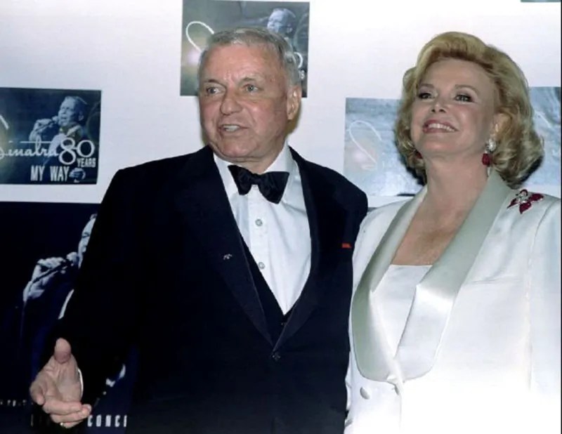 Legendary entertainer Frank Sinatra and his wife Barbara pose for photographers backstage at the taping of an ABC TV special "Sinatra: 80 Years My Way" at the Shrine Auditorium in Los Angeles, Calif., onon November 19, 1995. (REUTERS/Lee Celano)