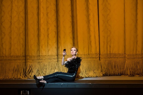 The evening begins with the Housekeeper (here played by Yanina Parienko). (Stephanie Berger)