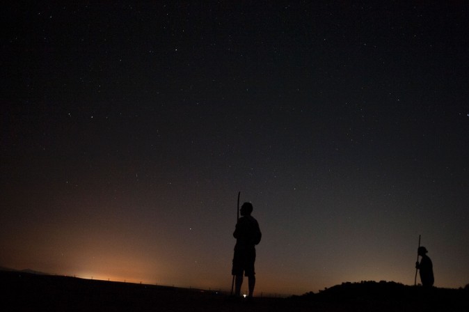 Volunteers take part in a tagging and control operation of flamingo chicks to monitor the evolution of the species on Fuente de Piedra lake, Spain, on July 29, 2017. The lake, which is the most important breeding ground for flamingos in the Iberian Peninsula, is also a nature reserve and a haven for over 170 species or birds. (JORGE GUERRERO/AFP/Getty Images)