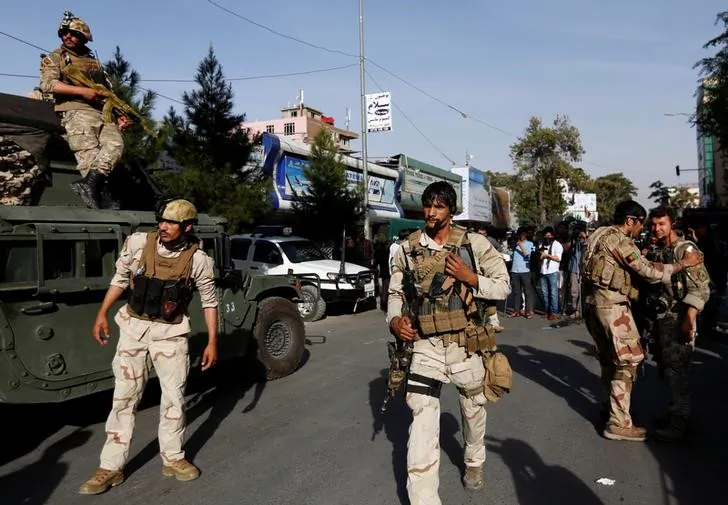 Afghan security forces leave the site of an attack on the Iraqi embassy in Kabul, Afghanistan July 31, 2017. (Reuters/Mohammad Ismail)