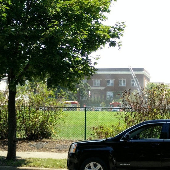 Emergency vehicles attend the scene outside the Minnehaha Academy, after part of the Christian private school collapsed, in Minneapolis.  Syd Davenport-Fey/via REUTERS
