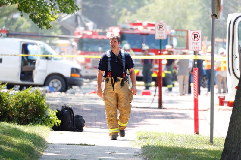 Emergency personnel work at the scene of school building collapse at Minnehaha Academy in Minneapolis, Minnesota, U.S., August 2, 2017.  REUTERS/Adam Bettcher