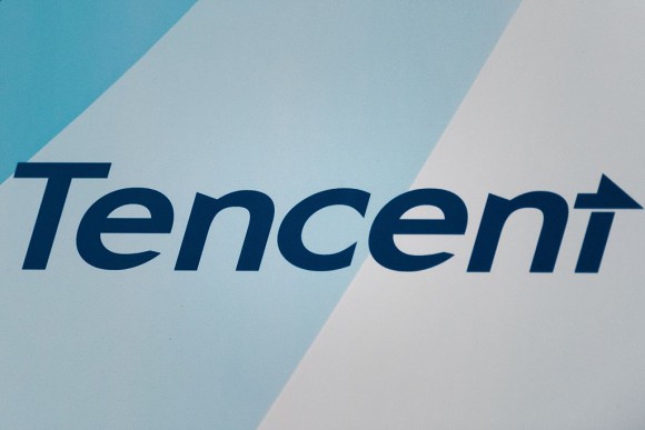 A logo of China Internet giant Tencent Holdings is seen during the announcement of the company's fourth-quarter results in Hong Kong on March 18, 2015. (PHILIPPE LOPEZ/AFP/Getty Images)