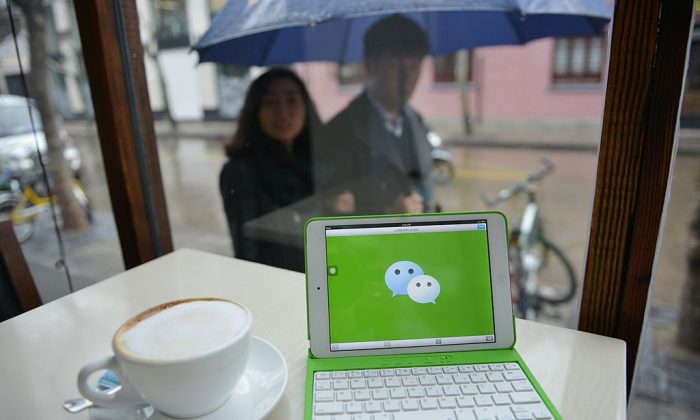 The logo of Tenent's WeChat service seen on a laptop in a cafe on March 12, 2014. (PETER PARKS/AFP/Getty Images)