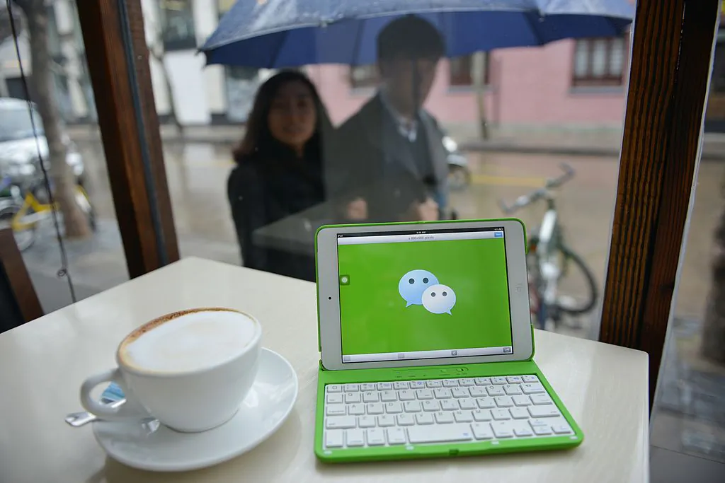 The logo of Tenent's WeChat service seen on a laptop in a cafe on March 12, 2014. (PETER PARKS/AFP/Getty Images)