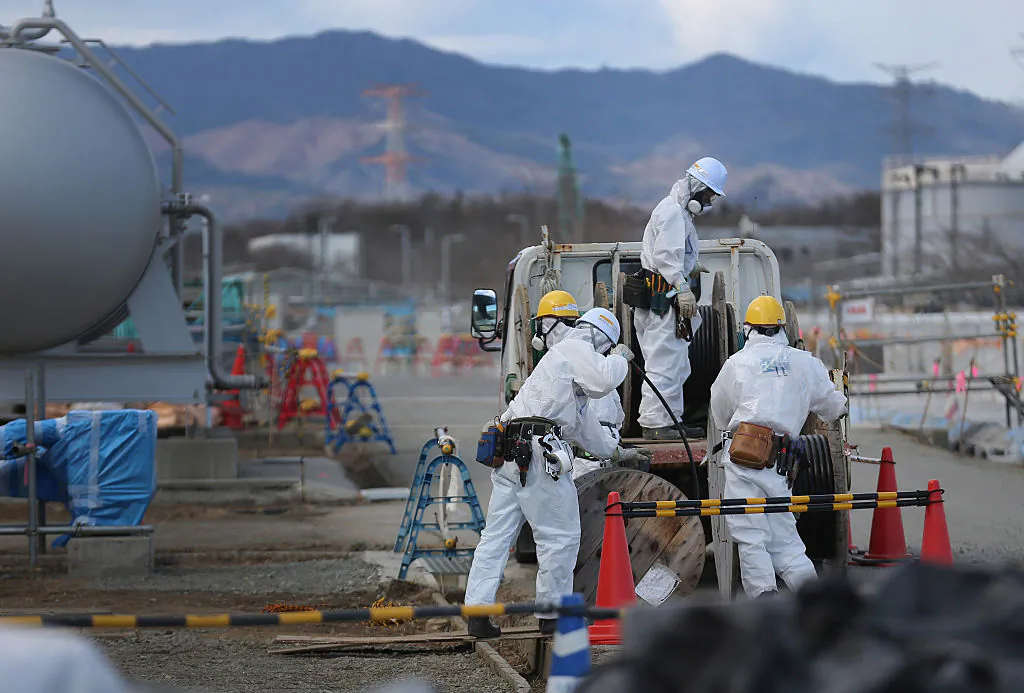 Workers continue the decontamination and reconstruction process at the Tokyo Electric Power Co.'s embattled Fukushima Daiichi nuclear power plant in Okuma, Japan on Feb. 25, 2016. (Christopher Furlong/Getty Images)