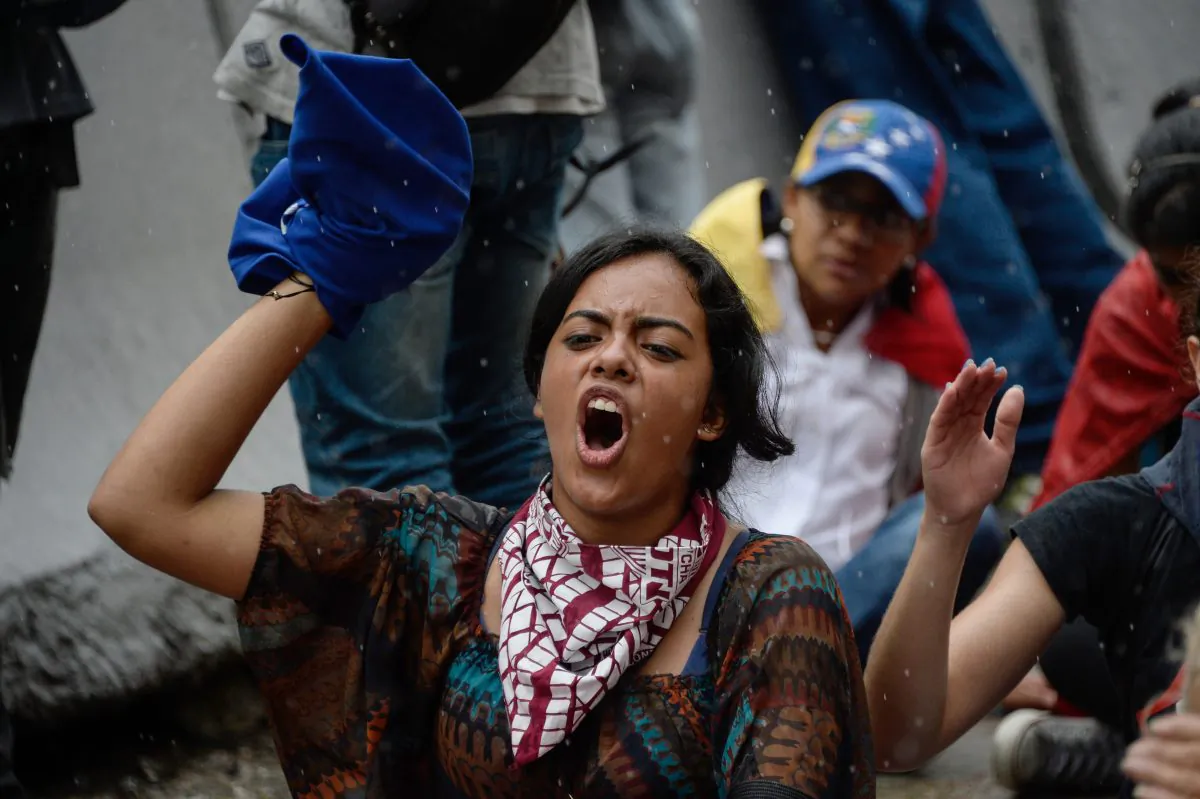 Opposition activists protest against the government in Caracas, Venezuela, on May 12. (FEDERICO PARRA/AFP/Getty Images)