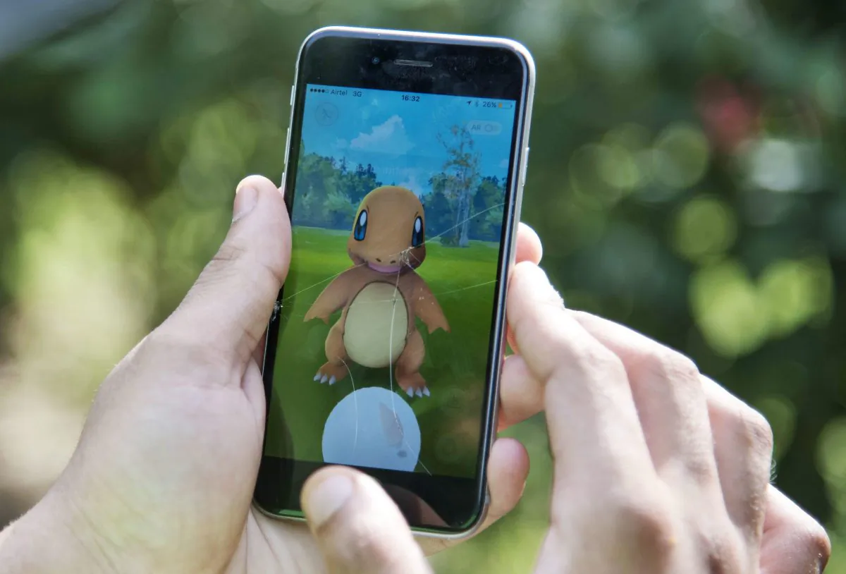 A Pokemon Go player plays the popular augmented reality game on an iPhone. (Thomas Cytrynowicz/AP Photo)