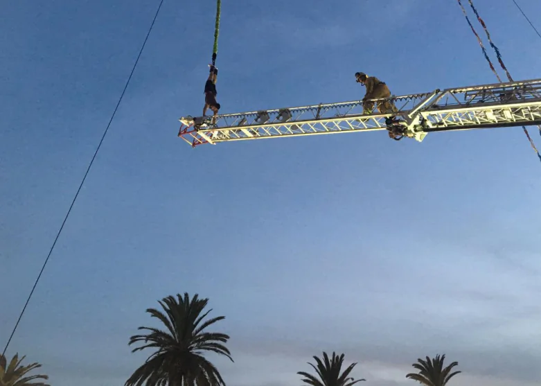 Roger Rodriguez, 19, is rescued by Ventura City fire fighters after his bungee jump at the Ventura City County Fair left him hanging, trapped, for 20 minutes. (Ventura City Fire Dept.)