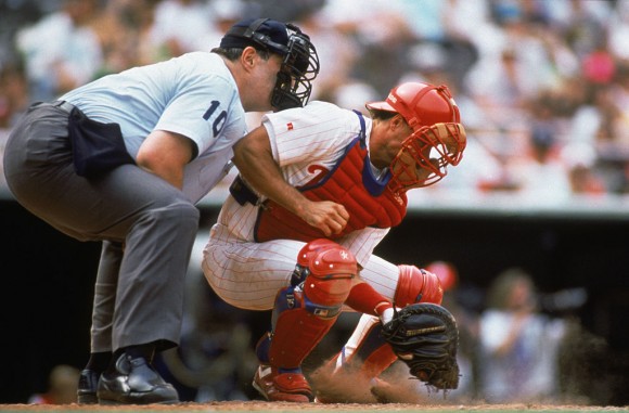 PHILADELPHIA - MAY 24:  Catcher Darren Daulton of the Philadelphia Phillies digs out a low pitch during the MLB game on May 24, 1992 in Philadelphia, Pennsylvania.  (Photo by Jeff Hixon/Getty Images)