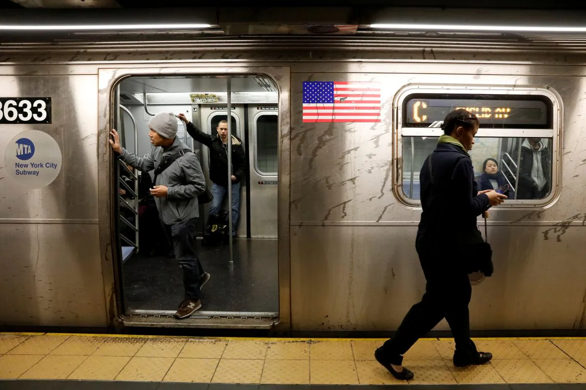 Passengers wait inside a stopped C subway train in New York City on April 21, 2017. (Brendan Mcdermid/File Photo via Reuters)