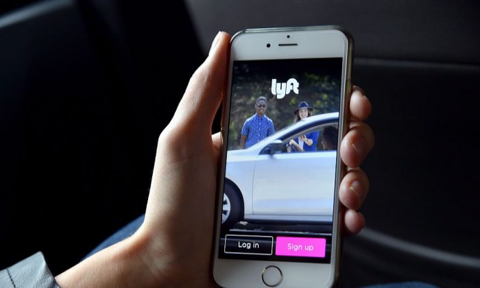 The Lyft app is seen on a passenger's phone in California. (Mike Coppola/Getty Images for Lyft)