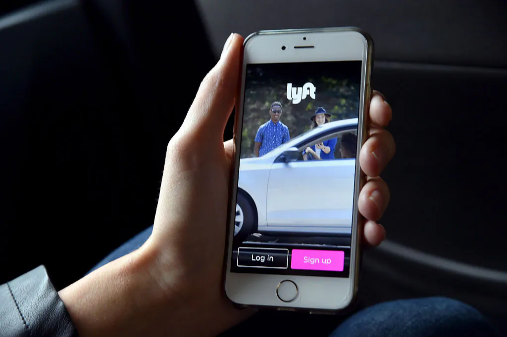 The Lyft app is seen on a passenger's phone in California. (Mike Coppola/Getty Images for Lyft)