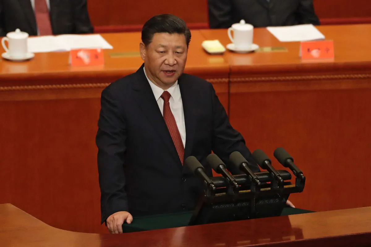 Chinese leader Xi Jinping speaks during a ceremony to commemorate the 90th anniversary of the founding of the People's Liberation Army at the Great Hall of the People in Beijing on Aug. 1, 2017. (Andy Wong/AFP/Getty Images)