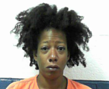 Erica Newsome, who was arrested after police found an 11-year-old's body dumped off the side of a road in West Viginia. (WVRJA)