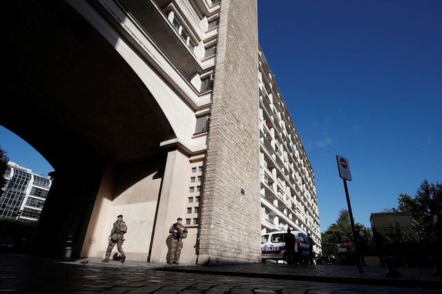 Soldiers secure the area near the scene where French soliders were hit and injured by a vehicle in the western Paris suburb of Levallois-Perret, France, August 9, 2017.     REUTERS/Benoit Tessier