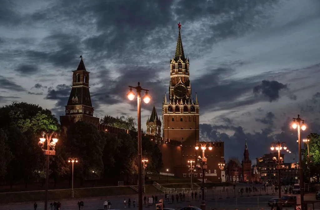 The sun sets behind the Kremlin at the Red Square in Moscow on June 8, 2017. (MLADEN ANTONOV/AFP/Getty Images)