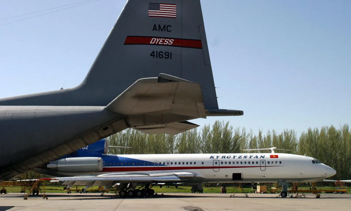 Undated file picture shows Kyrgyz passenger jet Tu-154 (background) and US military aircraft at an airfield of Manas airport outside Bishkek.  (VYACHESLAV OSELEDKO/AFP/Getty Images)