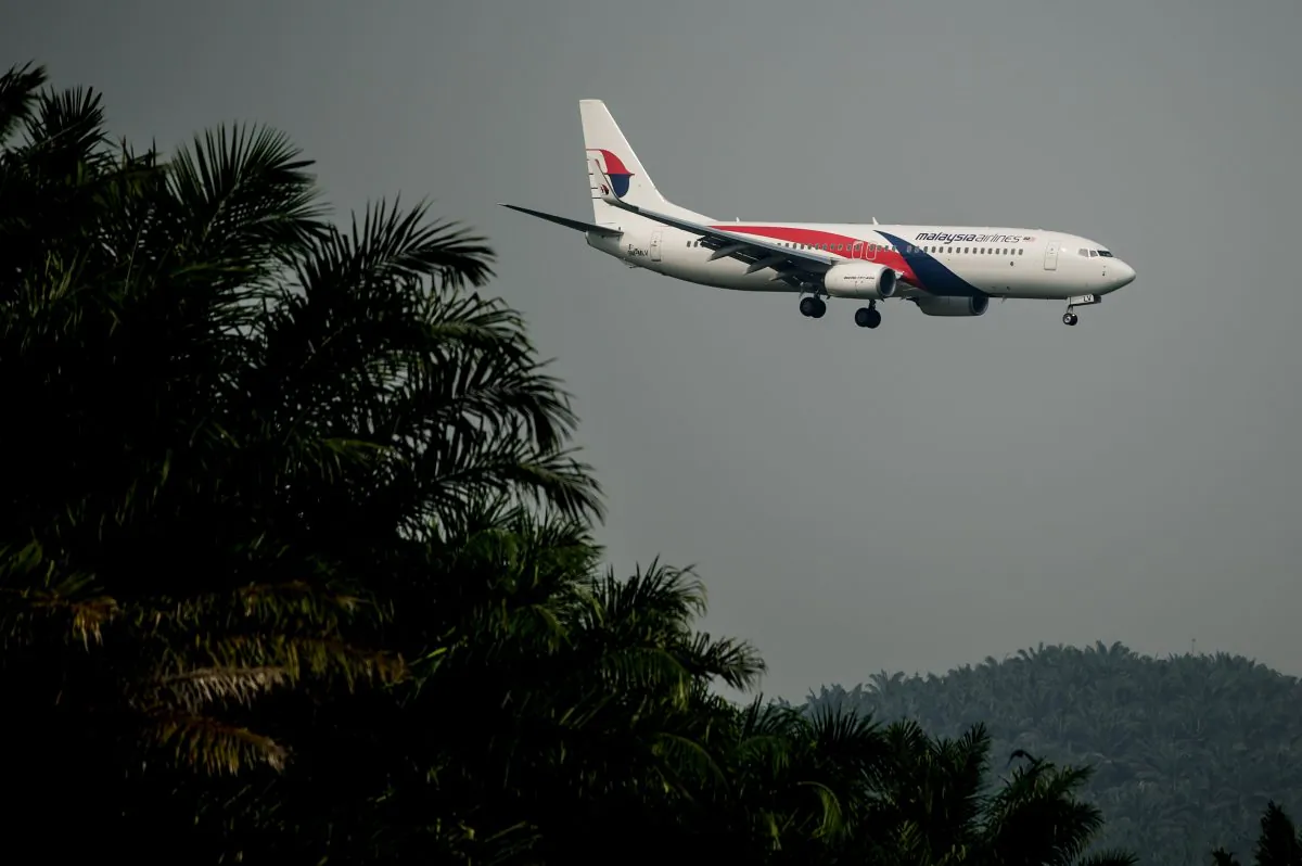 A Malaysia Airlines plane prepares for landing at the Kuala Lumpur International Airport in Sepang, outside Kuala Lumpur on July 21, 2014. (MOHD RASFAN/AFP/Getty Images)