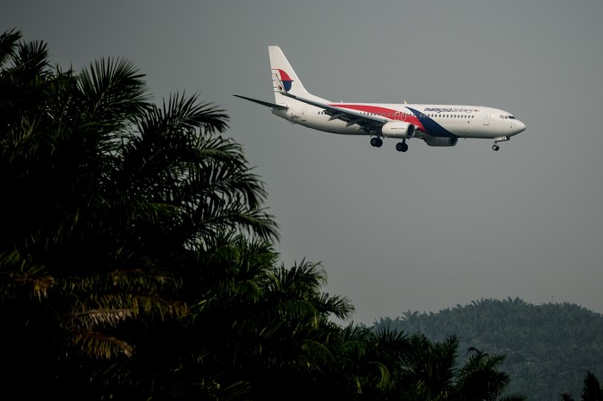 A Malaysia Airlines plane prepares for landing at the Kuala Lumpur International Airport in Sepang, outside Kuala Lumpur on July 21, 2014. (MOHD RASFAN/AFP/Getty Images)