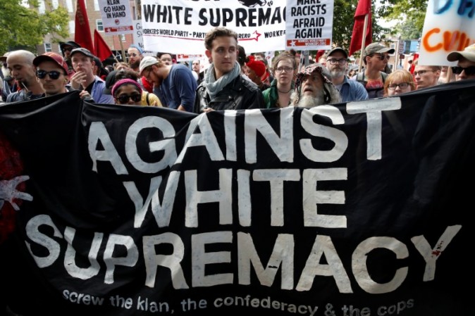 A group of counter-protesters rally against members of white nationalists in Charlottesville, Virginia, U.S., August 12, 2017. REUTERS/Joshua Roberts