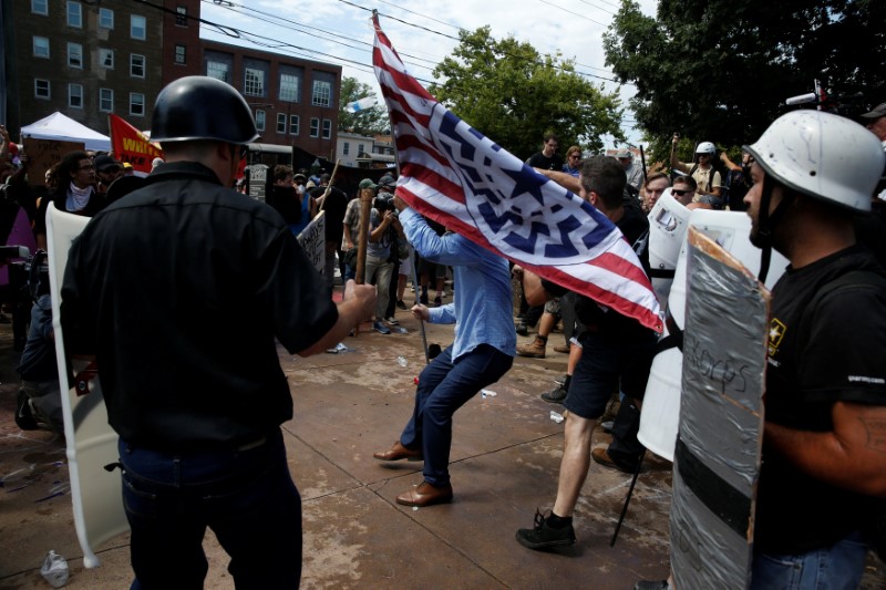 Members of white nationalist protesters are confronted by a group of counter-protesters in Charlottesville, Virginia, U.S., August 12, 2017. REUTERS/Joshua Roberts