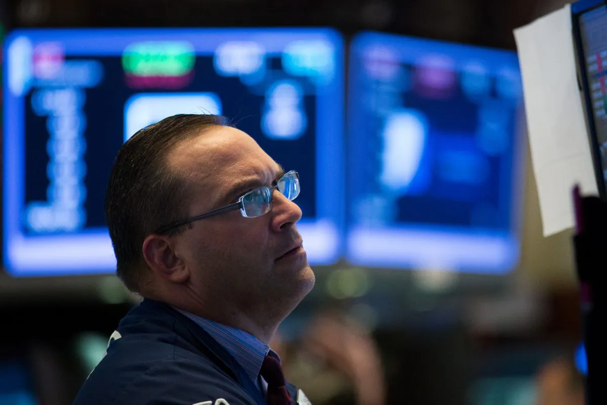 A trader works on the floor of the New York Stock Exchange (NYSE) ahead of the closing bell, July 18, 2017 in New York City. (Drew Angerer/Getty Images)